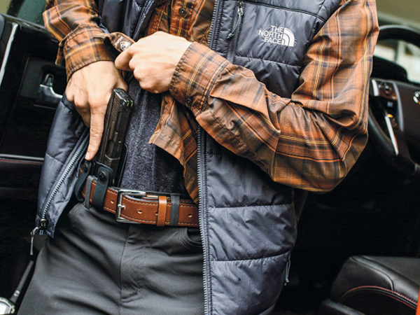 Man Drawing Gun from appendix carry