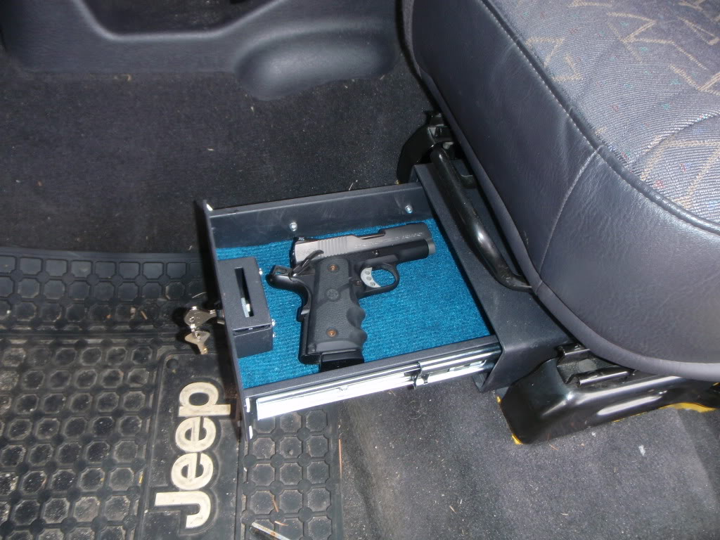handgun in safe under drivers seat in jeep